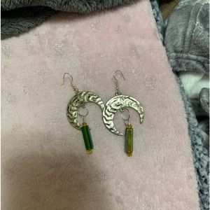 Earrings and showing off a bracelet i made for me and my mother!